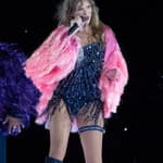 Taylor Swift delights her legion of fans as she takes to the stage in a staggering number of sparkling outfit changes during her Eras Tour stop in Tampa Florida