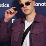 Joe Burrow posing on the red carpet.