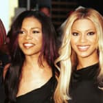 Destiny's Child posing together on the red carpet.
