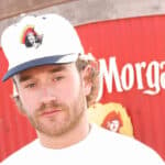 Summer House star West Wilson is teaming up with Captain Morgan to bring The Captain’s Challenge to tailgates across the country and gave fans a first look at the brand’s upcoming collab with Pirate Worldwide.