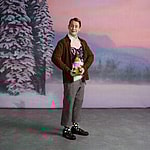 Macaulay Culkin poses with gnome in Happy Socks campaign