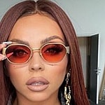 Jesy Nelson wearing red sunglasses