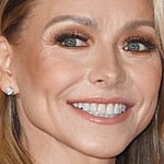 Kelly Ripa smiles at an event