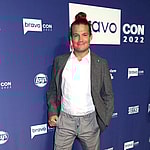 Gary King from "Below Deck" posing on the red carpet during a Bravo event.