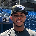 Ketel Marte posing in a baseball stadium.