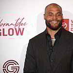 Dak Prescott posing on the red carpet.