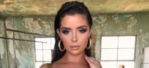 Demi Rose poses for the camera.