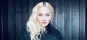 A photo showing Madonna in a black outfit.