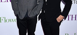 Bob Saget and John Stamos smiling.