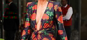 Lisa Rinna wore a rose-print YSL catsuit as leaving her hotel in New York City