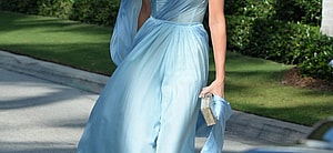 Ivanka Tump wears a flowing baby blue dress as she arrives to sister Tiffany Trump's wedding at Mar-A-Lago in Palm Beach