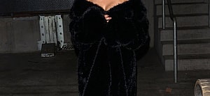 Kim Kardashian stunned in a black Faux Fur coat showing off her new platinum blonde hair at the Homeboy Industries Gala where she was honored