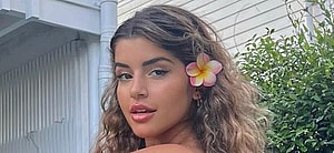 Zoe Gara faces the camera for a picture.