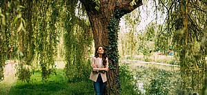 Princess of Wales, Kate Middleton, poses next to a tree, at her Windsor residence.