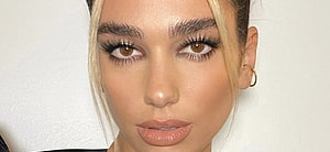 Dua Lipa poses close up