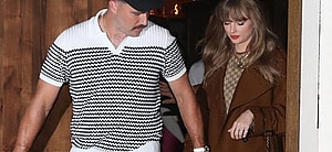 Taylor Swift and Travis Kelce holding hands