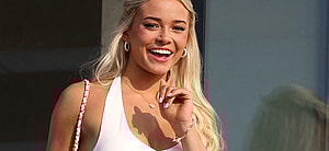 Olivia Dunne appears on a balcony at the home of Michael Rubin where he and Travis Scott are hosting the 4th July White party in Bridgehampton, New York. 04 Jul 2024 Pictured: Olivia Dunne, Lily Chee. Photo credit: MEGA TheMegaAgency.com +1 888 505 6342 (Mega Agency TagID: MEGA1162236_002.jpg) [Photo via Mega Agency]