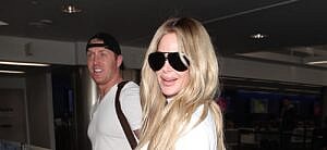 Kim Zolciak and Kroy Biermann walking