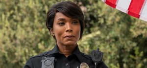 A photo of Angela Bassett in a police uniform