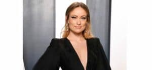 Olivia Wilde looks gorgeous in this v-neck shaped black dress.