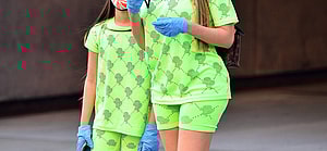 Farrah Abraham and Sophia wear gloves and designer face mask during a walk in Los Angeles