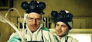 A photo showing the lead cast of 'Breaking Bad' cooking meth in a lab.