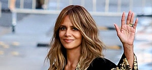 Halle Berry smiling and waving