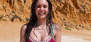 Nina Dobrev rocks a red bikini