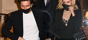 Brooklyn Beckham is seen hand in hand with Nicola Peltz as they leave the Ritz hotel