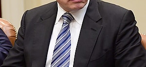 Elon Musk of Space X listens as United States President Donald Trump makes remarks during a breakfast and listening session with key business leaders in the Roosevelt Room of the White House in Washington, DC on Monday, January 23, 2017.