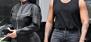 A newly single Kanye West is seen leaving his hotel with new girlfriend Chaney Jones in Miami