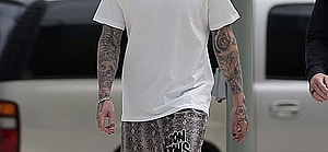 Adam Levine shows off his unique style as he takes a walk in Miami