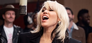 Miley Cyrus urges fans to Do it for the phones as she sings in T-Mobile Super Bowl commercial