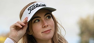 Grace Charis goes golfing in a braless crop top