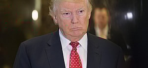 Donald Trump and political officials seen in the Trump Tower lobby in NYC