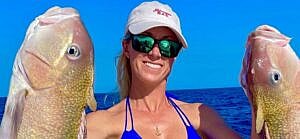 Vicky Stark shows off her big catches in a tiny blue bikini.