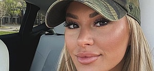 Kindly Myers sitting in traffic