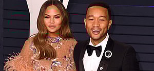 Chrissy Teigen and John Legend arrive at Vanity Fair Oscar Party