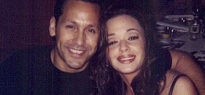 A photo of Leah Remini and husband Angelo Pagán smiling