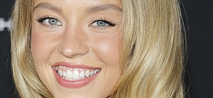 Sydney Sweeney smiling close up