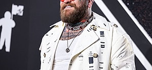 Teddy Swims posing on the red carpet.