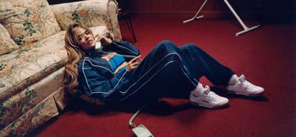 Karol G, Reebok.