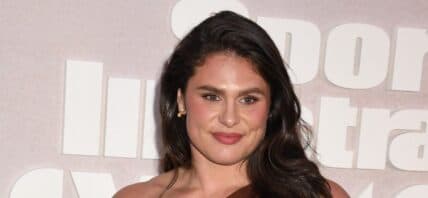Ilona Maher posing on the red carpet.