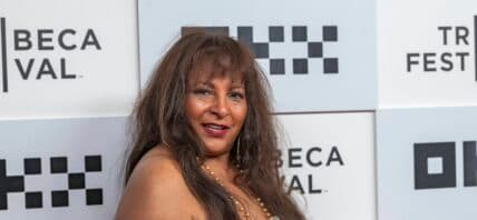 Pam Grier posing on the red carpet.