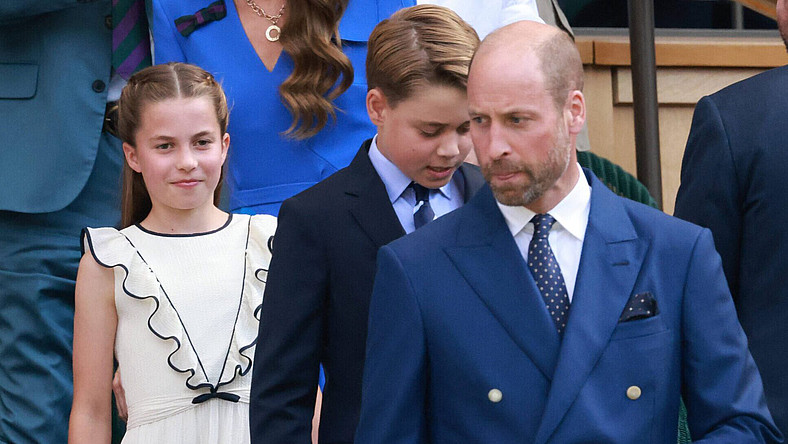 Prince William, The Prince of Wales, Prince George, Princess Charlotte and Catherine, The Princess of Wales watch on as Carlos Alcaraz celebrates a point on day fourteen of the 2025 Wimbledon Championships at the All England Lawn Tennis and Croquet Club, London