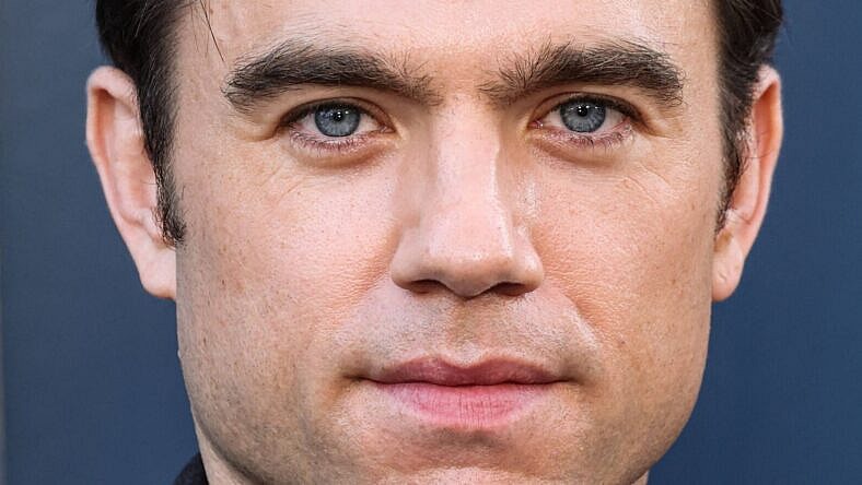 Patrick Ball, The Pitt, posing on the red carpet.