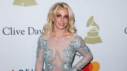 Singer Britney Spears wearing a custom Uel Camilo dress, Loriblu shoes and bag, and a Jen Hansen ring arrives at The Recording Academy And Clive Davis' 2017 Pre-GRAMMY Gala held at The Beverly Hilton Hotel on February 11, 2017 in Beverly Hills, Los Angeles, California, United States.