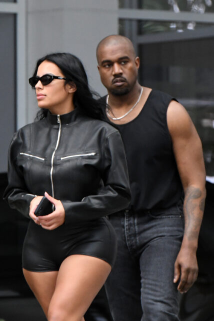 A newly single Kanye West is seen leaving his hotel with new girlfriend Chaney Jones in Miami