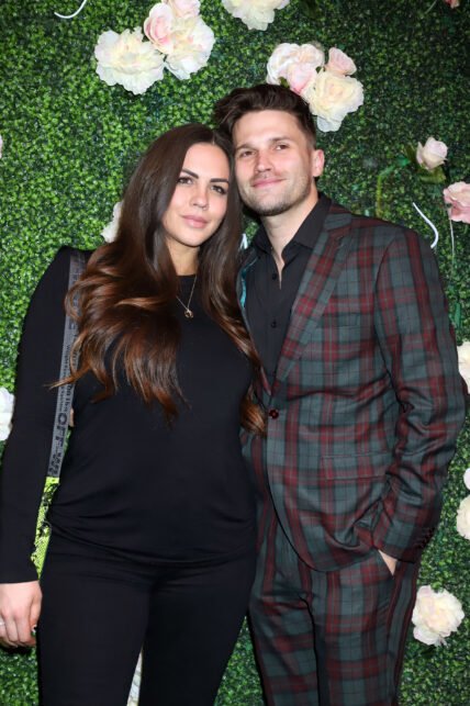 Tom Schwartz and Katie Maloney posing together on the red carpet.