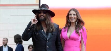 Billy Ray Cyrus and Elizabeth Hurley on the red carpet